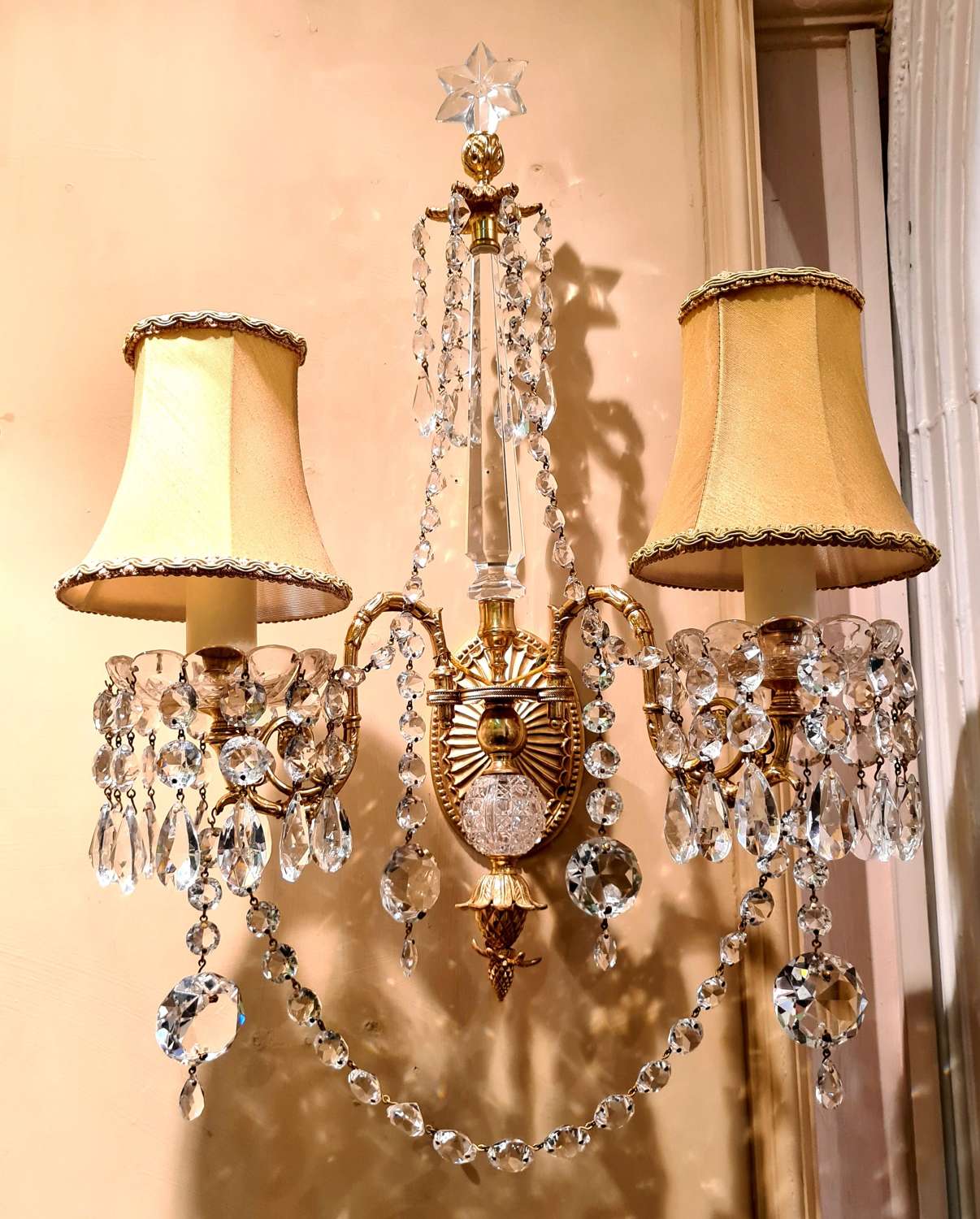 A Pair of Gilded Bronze Wall Lights
