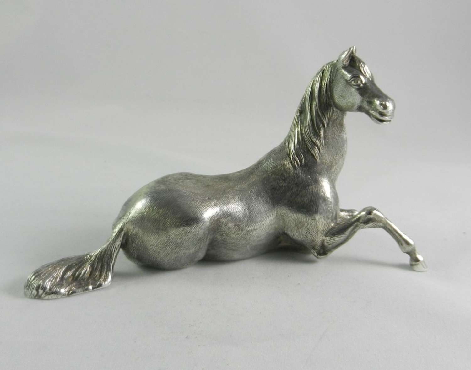 Silver Horse Figure.